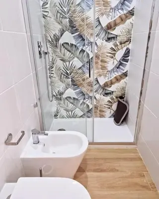 a bathroom with a toilet and a shower and a sink at Domus green in Rome