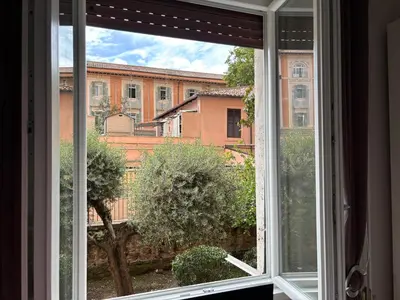 an open window with a view of a building at Sweet Anna in Rome