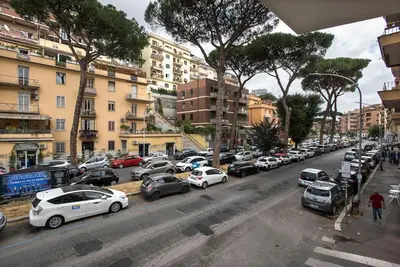 a bunch of cars parked on a city street at Monte Sacro apartment for 6 guests Metro B in Rome