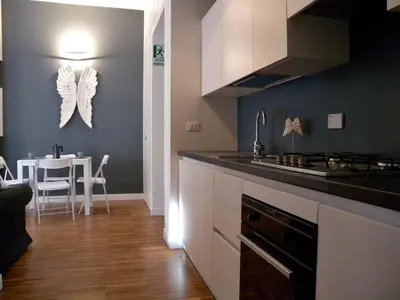 a kitchen with a sink and a counter top at Vatican Angels Casa Vacanze in Rome