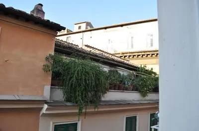 a balcony with plants on the side of a building at Pantheon Suite in Rome