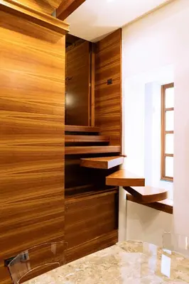 a wall of wood paneling in a room at Arancio Luxury Accomodation in Rome