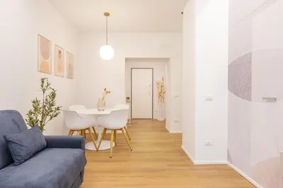 a living room with a couch and a table at Caesar Boutique Apartment in Rome