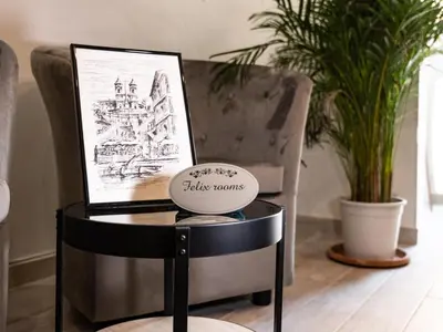 a coffee table with a drawing of a house at Felix Rooms in Rome