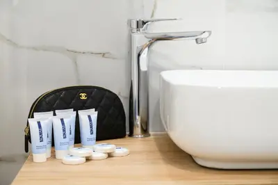 a bathroom with a toilet and a sink and pills at Domus Ludovica in Rome