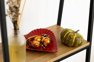 a table with a bottle of wine and two gourds at Casa Ines in Rome