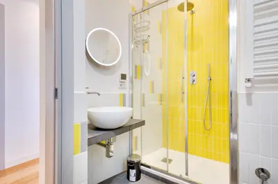 a bathroom with a sink and a shower at Casa Ines in Rome