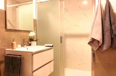 a bathroom with a sink and a shower at Sky Hub21 in Rome