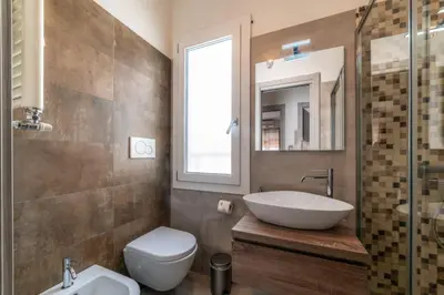 a bathroom with a sink and a toilet and a tub at Giorgia Flat - Tiburtina Train Station - Wi-Fi in Rome