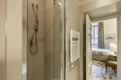 a bathroom with a shower and a walk in shower at Piazza della Maddalena view in Rome