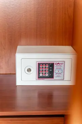 a microwave oven sitting on top of a table at La Terrazza sul Parco Appartamento per famiglie, Vaticano, Metro A in Rome