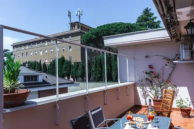 a balcony with a view of a building at Vatican Luisa in Rome