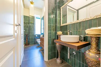 a bathroom with a sink and a mirror at Casa Maria al Flaminio in Rome
