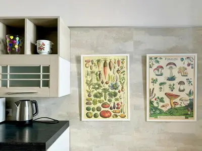 two framed pictures of vegetables on a kitchen wall at JHHIT - In the heart of Rome near the Colosseum in Rome