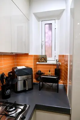 a kitchen with a coffee maker on a counter at Granma Apt in Rome