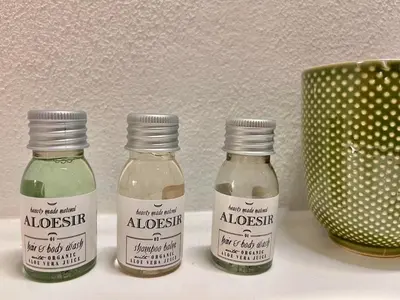 a group of three bottles of vinegar and a vase at Silla Studiò - piccolo appartamento a due passi dal Vaticano in Rome