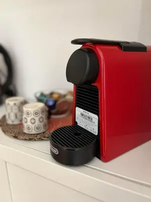 a red toaster sitting on top of a counter at Silla Studiò - piccolo appartamento a due passi dal Vaticano in Rome