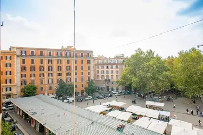 an overhead view of a market in a city at Manara flats in the Heart of Trastevere in Rome