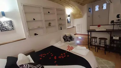 a living room with a couch and a table at Eleganza e Confort nel Cuore dei Parioli in Rome