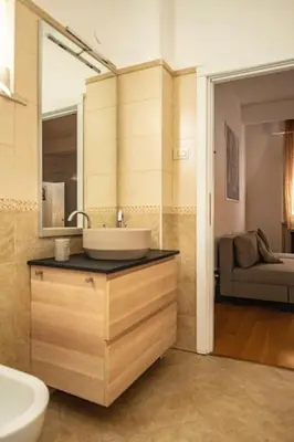a bathroom with a sink and a mirror at Casa Broccoletti in Rome