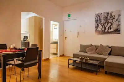 a living room with a couch and a table at Casa Broccoletti in Rome