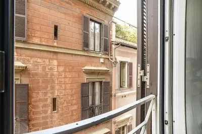 a view of a brick building from a window at PANTHEON 2 - LARGE APARTMENT IN THE HEARTH OF ROME a in Rome
