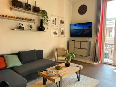 a living room with a couch and a table at CBMC - Couldn't Be More Central in Rome
