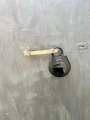 a metal doorhandle with a lock on a wall at Spacious Studio in Via dei Coronari in Rome