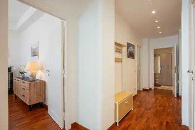 an empty hallway with a dresser and a room at Carpegna Park Apartment by Cornelia subway in Rome