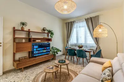 a living room with a couch and a table at Vatican Cartographer in Rome
