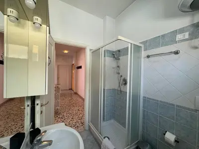 a bathroom with a shower and a sink at Vintage Charm Apt in Aurelio in Rome