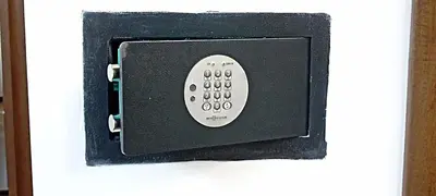 a remote control is attached to a wall at Colosseo Dream in Rome
