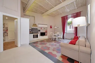 a living room with a couch and a table at dolce casa colosseo 2 in Rome