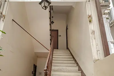 a stairway in an old building with a bunch of stairs at Apartment B5 in the center of Rome WiFi and AC in Rome