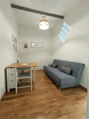 a living room with a couch and a table at Apartment B5 in the center of Rome WiFi and AC in Rome