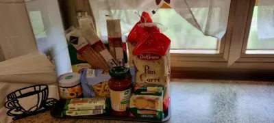 a group of food items on a counter next to a window at Barbara Sweet Home - Appartamento Intero in Rome