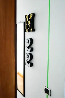 a close up of a door with a mirror at Milvio22 Apartment in Rome
