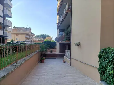 a walkway between two buildings in a city at Domus Marco Aurelio in Rome