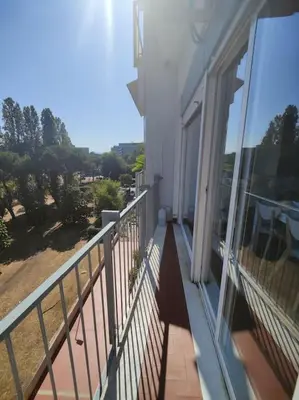 a balcony of a house with a view of a yard at Culla di Diego BOX auto, Sospesi nel Cielo! in Rome