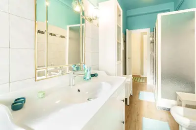 a bathroom with a sink and a toilet at Good Vibes Vaticano in Rome
