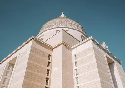 a building with a dome on top of it at Stanza Del Principe in Rome