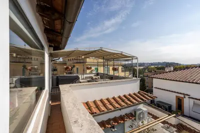 a balcony with a view of a building at LaDolcevita - Ponte Milvio Stunning View Penthouse in Rome