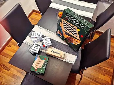 a table with some books on top of it at Viale dei Re di Roma in Rome
