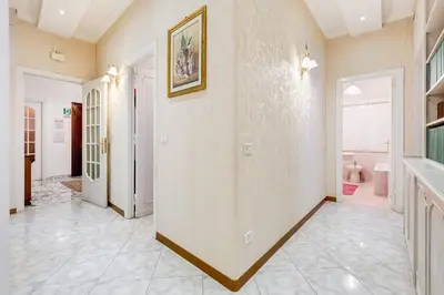 a hallway of a home with a tile floor at Royal Vatican house JND in Rome