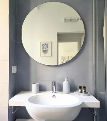 a bathroom with a sink and a mirror at L'Ottavo Re di Roma in Rome