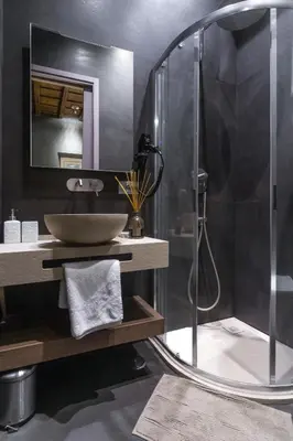 a bathroom with a shower and a sink at Piazza di Spagna Luxury Apartment in Rome
