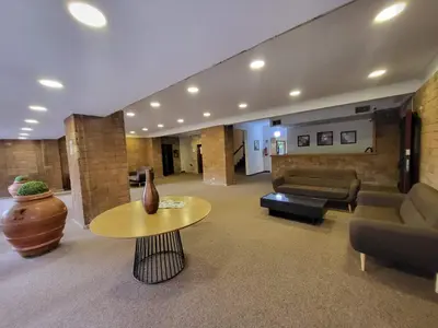 a living room with a couch and a table at Venus Inn Casa Vacanze AURELIA ANTICA in Rome