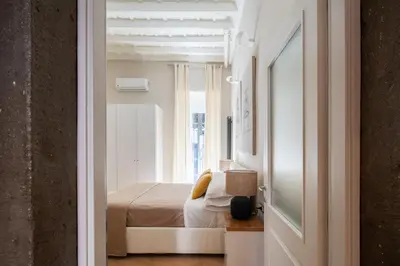 a bedroom with a bed and a window at THE BREAK - Campo Marzio Maison Deluxe in Rome