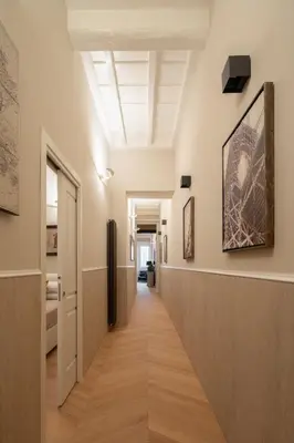 a hallway in a building with a ceiling at THE BREAK - Campo Marzio Maison Deluxe in Rome