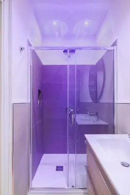 a bathroom with a glass shower and a sink at THE BREAK - Campo Marzio Maison Deluxe in Rome